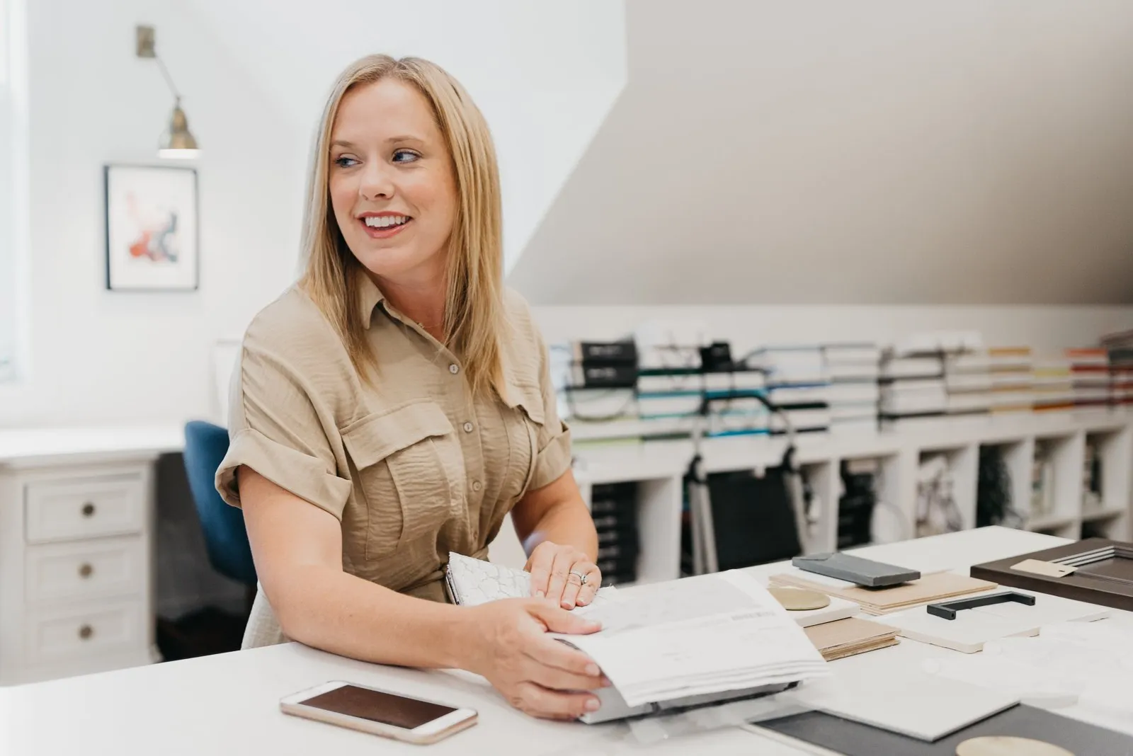 Lisa Moody reviewing finish samples in the Grapevine Designs studio in Surrey